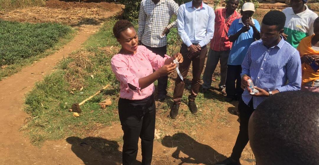 Mzumbe staff training community monitors to do the water testing