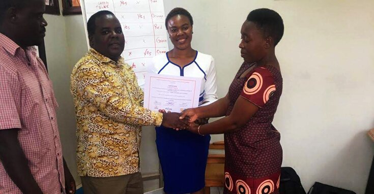 Community monitor receiving certificate of the training